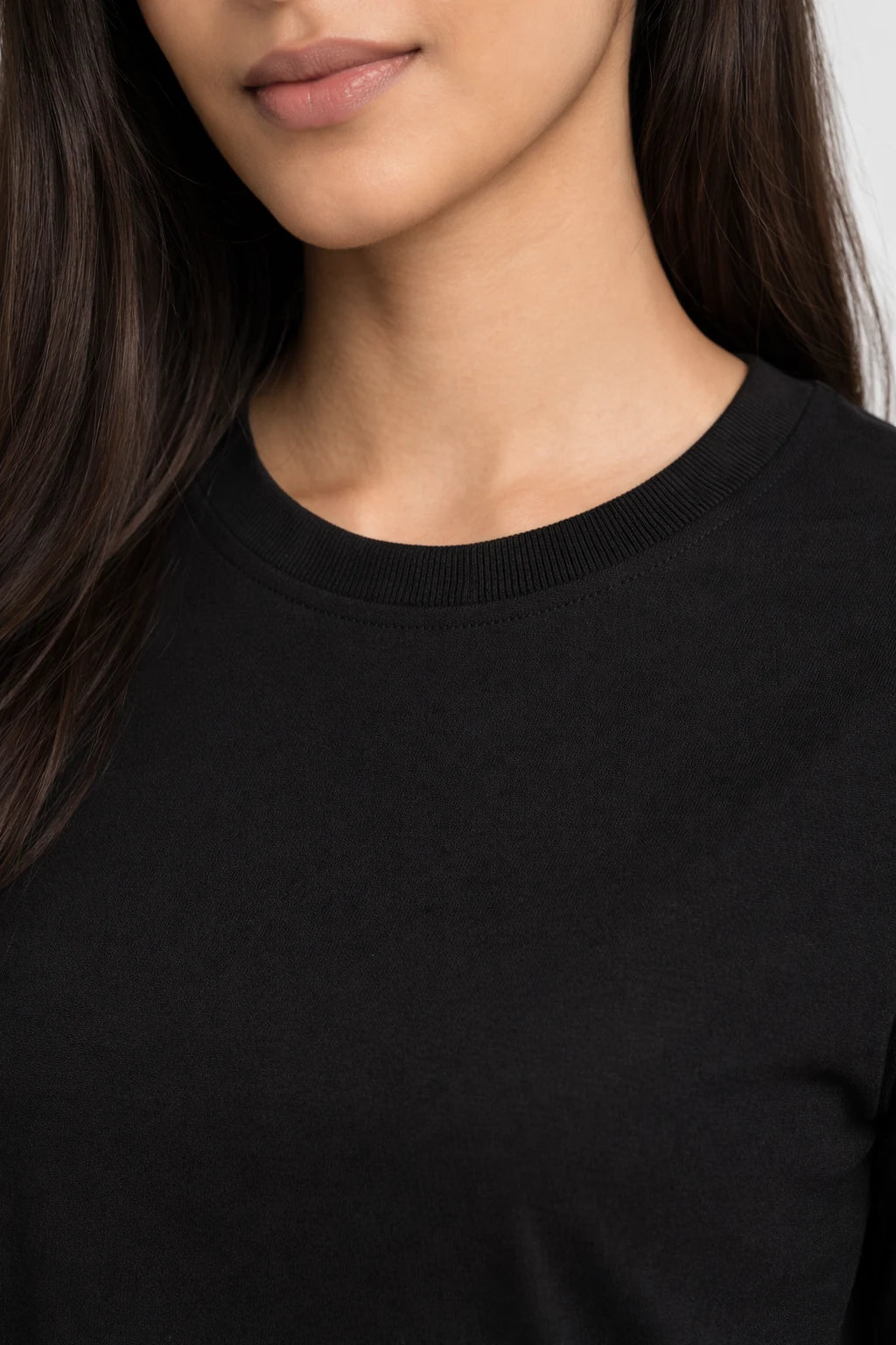 Women’s black regular fit t-shirt made from 200 GSM 100% cotton with structured rib neckline